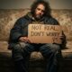 homeless man on a sofa