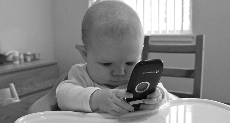 Baby on a phone.