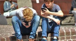 Teens on phones.